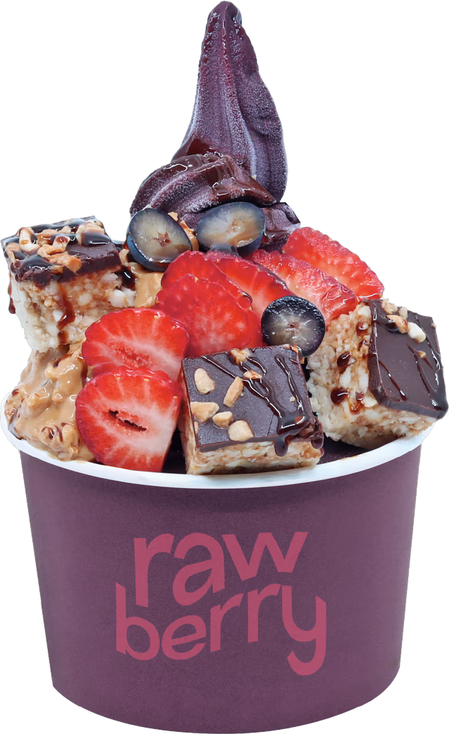 Acai bowl with strawberries, blueberries and chocolate pieces